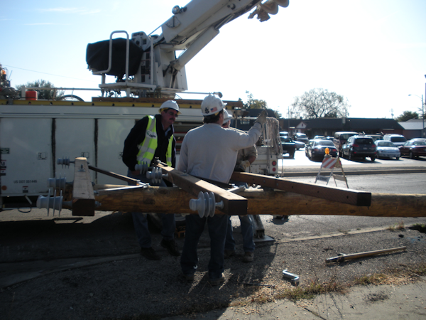 Public Utility Crew Setting a Pole
